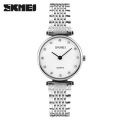 SKMEI 1223 Reloj de cuarzo de acero inoxidable con esfera de cristal para mujer